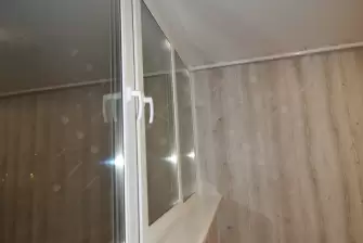 Отделка балкона под ключ с теплым остеклением ПВХ Рехау